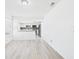 Dining area featuring modern flooring and an open view to kitchen, creating an ideal space for Gathering and guests at 2409 Atrium Cir, Orlando, FL 32808