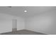 A clean, carpeted bedroom with neutral colors, perfect for relaxation and personalization at 4939 Worchester Dr, Kissimmee, FL 34746