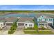 A neighborhood with houses and lake views, showcasing the beautiful location at 4939 Worchester Dr, Kissimmee, FL 34746