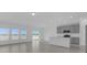 Bright open-concept kitchen and living space with ample natural light and backyard view at 4939 Worchester Dr, Kissimmee, FL 34746