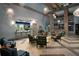Welcoming lobby area with plush seating, elegant decor, and a friendly reception desk for residents and guests at 951 Splash Shot Pl # 0, Davenport, FL 33896