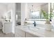 Elegant bathroom with double vanity and a large mirror at 6979 Big Bend Dr, Saint Cloud, FL 34771