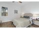 Spacious bedroom with wood-look floors and a neutral color palette at 6979 Big Bend Dr, Saint Cloud, FL 34771