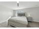 Comfortable main bedroom with neutral tones, wood floors, and ample natural light at 724 Tahiti Dr, Kissimmee, FL 34758