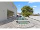 Backyard view featuring a pool, patio, and the home's exterior at 7801 Belvoir Dr, Orlando, FL 32835