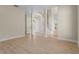 Spacious living area with stairs, light floors, and neutral walls for decorating at 7801 Belvoir Dr, Orlando, FL 32835