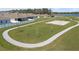 An aerial view of the community park, walking trails, and volleyball court at 4945 Worchester Dr, Kissimmee, FL 34746