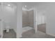 Bathroom featuring a tiled shower and sleek fixtures at 4945 Worchester Dr, Kissimmee, FL 34746