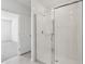 Modern bathroom showcasing a glass-enclosed shower with sleek fixtures at 1390 Current Pl, Haines City, FL 33844