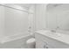 A bathroom that includes a shower and tub combination, a sink and a large mirror at 3824 Giorgio Dr, Winter Haven, FL 33884