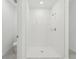 Bright bathroom showcases a spacious shower with a white tile surround and modern fixtures at 3824 Giorgio Dr, Winter Haven, FL 33884