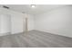 Bedroom with neutral carpet, light walls, and access to an ensuite bathroom at 3824 Giorgio Dr, Winter Haven, FL 33884