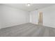 Bedroom featuring neutral carpet and an ensuite bathroom, offering comfort and privacy at 3824 Giorgio Dr, Winter Haven, FL 33884