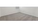 The light and neutral tone of this carpet is highlighted with a window and trim at 3824 Giorgio Dr, Winter Haven, FL 33884