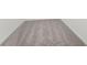 Carpet flooring with a neutral color tone, offering a soft and comfortable feel underfoot at 3824 Giorgio Dr, Winter Haven, FL 33884