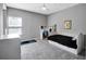Charming bedroom with a daybed, desk, and ample natural light at 708 Fox Edge Ct, Oviedo, FL 32765