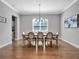 Elegant dining room featuring a large table and chandelier at 708 Fox Edge Ct, Oviedo, FL 32765