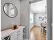 Bright entryway with white console table and mirror at 708 Fox Edge Ct, Oviedo, FL 32765