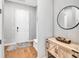 Neutral colored foyer with decorative console table at 708 Fox Edge Ct, Oviedo, FL 32765
