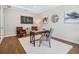 Bright home office features wood floors and stylish furnishings at 708 Fox Edge Ct, Oviedo, FL 32765