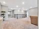 Spacious loft area features plush carpeting, and a neutral color palette at 708 Fox Edge Ct, Oviedo, FL 32765