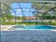 Screened pool and spa with spacious patio, perfect for entertaining at 708 Fox Edge Ct, Oviedo, FL 32765