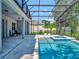 Relaxing pool and patio area with screened enclosure at 708 Fox Edge Ct, Oviedo, FL 32765