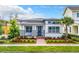 Charming single-story home featuring a neatly landscaped front yard and inviting brick pathway at 8851 Sperry St, Orlando, FL 32827