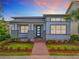 Charming single-story home featuring a neatly landscaped front yard and inviting brick pathway at 8851 Sperry St, Orlando, FL 32827