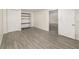 Finished basement space featuring a large closet, tile floors, and access to additional living space at 2524 Dellwood Dr, Orlando, FL 32806