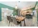 Open layout featuring dining room and kitchen, with modern decor and plenty of space at 2524 Dellwood Dr, Orlando, FL 32806