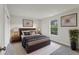 Comfortable bedroom with a large window, neutral decor, and plush bedding at 610 Walker St, Holly Hill, FL 32117