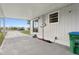 Spacious carport with access to the home and ample space for parking at 610 Walker St, Holly Hill, FL 32117