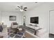 Bright living room featuring modern furniture and neutral colors at 610 Walker St, Holly Hill, FL 32117