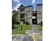 Inviting condo building with private balconies and well-maintained landscaping at 1932 Lake Atriums Cir # 70, Orlando, FL 32839