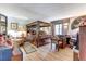 This bedroom features a four-poster bed, desk, and traditional decor, creating a warm and inviting atmosphere at 1546 Stormway Ct, Apopka, FL 32712