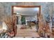 Open foyer showcasing wood floors and providing a view into the spacious living room with comfortable seating arrangement at 1546 Stormway Ct, Apopka, FL 32712