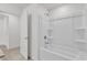 Bright bathroom featuring a shower and bathtub combination at 3409 Narrows Dr, Lakeland, FL 33810
