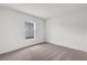 Cozy bedroom with neutral carpet, a window and white walls at 3409 Narrows Dr, Lakeland, FL 33810