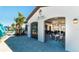 Exterior view of the community bar and lounge with indoor and outdoor seating at 2428 Dubai St, Kissimmee, FL 34747