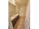Bathroom featuring double sinks, granite countertops, and a tiled floor at 5200 Landmark Dr, St Cloud, FL 34771