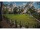 Large private backyard with a pristine soccer field at 16828 Vinci Way, Montverde, FL 34756