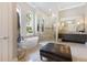 Luxurious bathroom with soaking tub, walk-in shower, and double vanity at 16828 Vinci Way, Montverde, FL 34756