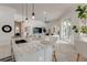 Island kitchen with granite countertops and open to Gathering room at 16828 Vinci Way, Montverde, FL 34756