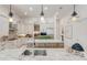 Modern kitchen with large island and stainless steel appliances at 16828 Vinci Way, Montverde, FL 34756