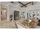 Spacious living room featuring high ceilings, tile flooring, and open layout into the dining area at 16828 Vinci Way, Montverde, FL 34756