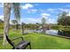 Peaceful backyard setting overlooking a tranquil lake at 1053 Abadan Dr, Deltona, FL 32725