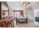 Relaxing bedroom with a metal bed frame and dresser at 1053 Abadan Dr, Deltona, FL 32725