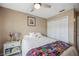 Bright bedroom with a queen bed and ample closet space at 1053 Abadan Dr, Deltona, FL 32725