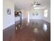 Spacious living room featuring gleaming hardwood floors and abundant natural light at 2652 Carrickton Cir, Orlando, FL 32824